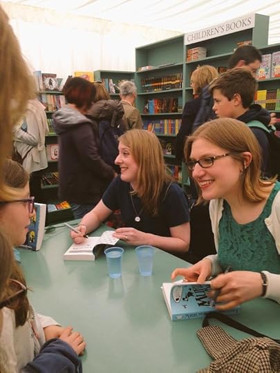 Signing books in the bookshop tent - picture by Harriet Venn