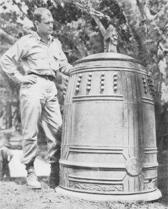 American officer standing by the bell from Shuri Castle on Okinawa, 1945. (US Army Center of Military History)