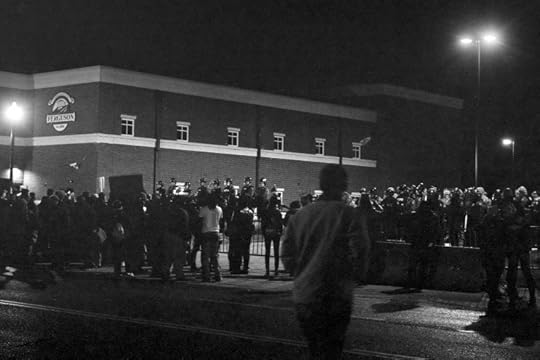 Protests in front of the Ferguson Police Department (and fire station and municipal court), over the Thanksgiving weekend. Photo by Mike Tigas. CC0 1.0 via madmannova Flickr.