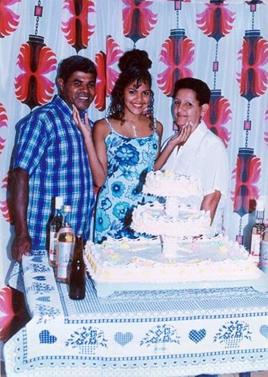 Mayret's Cumple 15 with her parents.