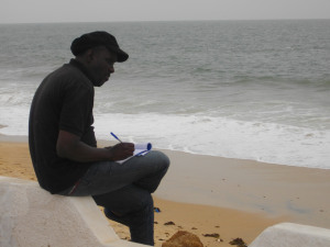 Babacar taking notes