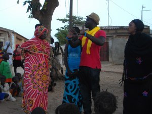 An audience member comes up to change the scene