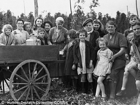 Hop-pickers at the start of the 1948 picking season, Kent. Note the age range. 