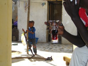 at home of Adama's friend