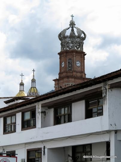 Church of Our Lady of Guadalupe peeking over the rooftops