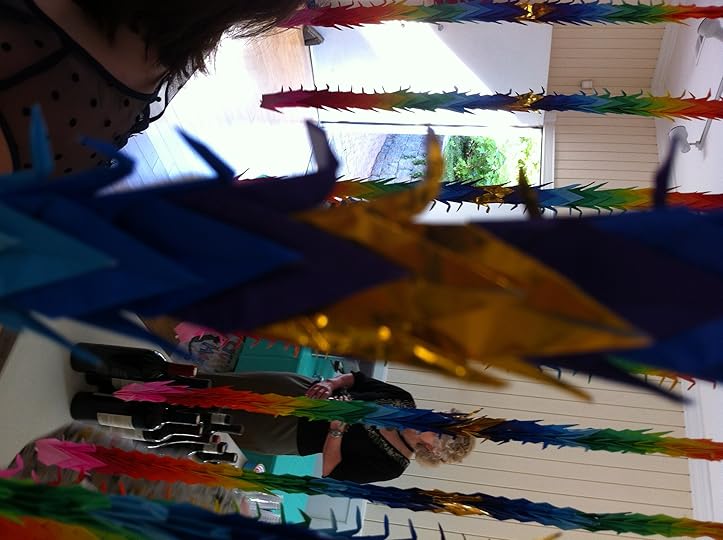 A close-up of the 1,000 origami cranes my niece and her new husband folded for their wedding.