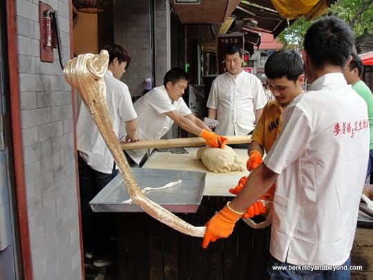 pulling sesame candy in Muslim Quarter in Xi'an, China
