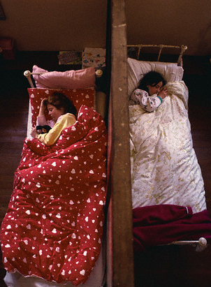 ca. 1991, Ireland --- Students Sleeping in Catholic School Dormitory --- Image by © Annie Griffiths Belt/Corbis