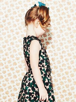 Pixie wearing one of her own bow creations from Pixie Bows.