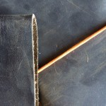 Both ZLYC journals. As you can see, the leather scratches if you look at it funny. But that's OK. It will develop character as I use it.