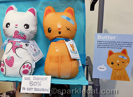 Helping kitties with stuffies