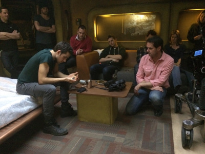 Stunt Coordinator John Stead directs Marc Bendavid's (ONE) discovery of the pendant. 