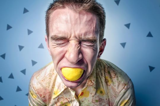 Man Sucking Lemon
