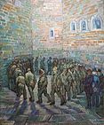 A group of male prisoners (or inmates), walk around and around in a circle, in an indoor prison (or hospital) yard. The high walls and the floor are made of stone. In the right foreground the men are being watched by a small group of three, two men in civilian clothes with top hats and a policeman in uniform. One of the prisoners in the circle looks out towards the viewer, and he has the face of a beardless Vincent van Gogh.