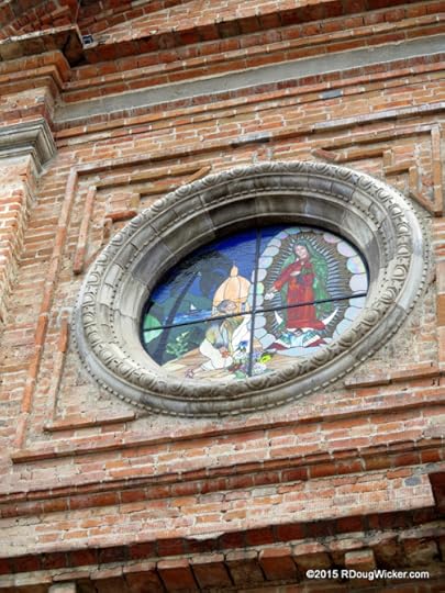 Stained glass set in old brick