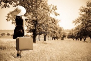 11147919-lonely-girl-with-suitcase-at-countryside