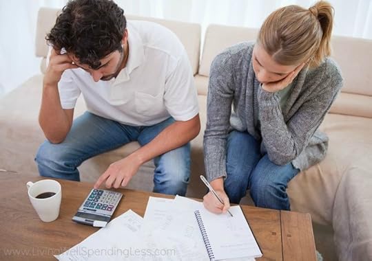 couple communicating calculating their finances
