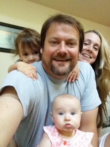 Daddy at the loving center of it all.