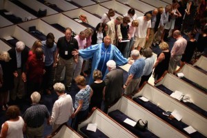 CHARLESTON, SC - JUNE 18: The Rev. Sidney Davis leads mourners during a community prayer service for the nine victims of last night's shooting at the historic Emanuel African Methodist Episcopal Church, at Second Presbyterian Church June 18, 2015 in Charleston, South Carolina. Dylann Storm Roof, 21, of Lexington, South Carolina, who allegedly attended a prayer meeting at the church for an hour before opening fire and killing three men and six women last night, was arrested today. Among the dead is the Rev. Clementa Pinckney, a state senator and a pastor at Emanuel AME, the oldest black congregation in America south of Baltimore, according to the National Park Service. (Photo by Chip Somodevilla/Getty Images) ***BESTPIX***