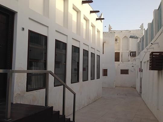 Glass windows fitted over traditional wooden window screens.