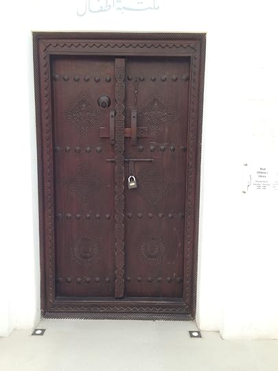 Heavy, carved wooden doors like this and the one below are typical to this style of architecture.