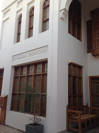 The clean, graceful lines and the stark contrast between wood and white plaster is so lovely.