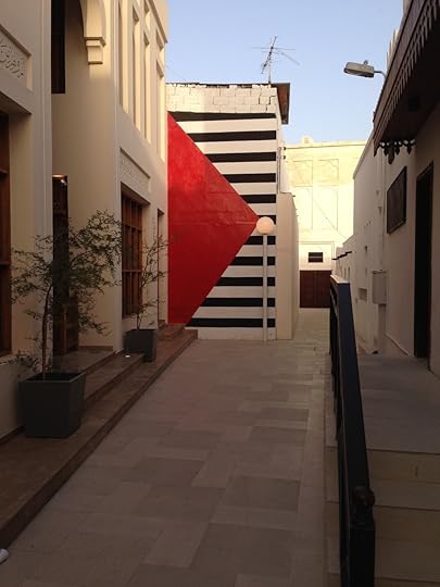 This mural is right next door to the cool, traditional building in the previous picture (well, it's visible here at the left, though you're probably not noticing it here.)