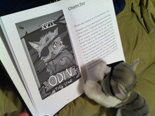 Odin reading Bad Blood Rising