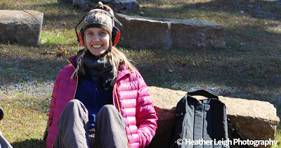Rachel Yingling sitting against rock in West Virginia in October 2014