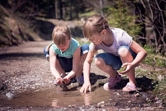kids playing in stream