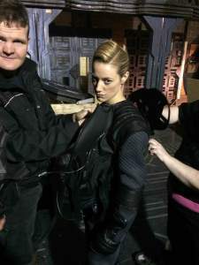 The ever-sassy Zoie Palmer suits up!