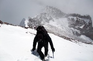 Slogging through snow close to the place where Conway and Maquignaz turned around
