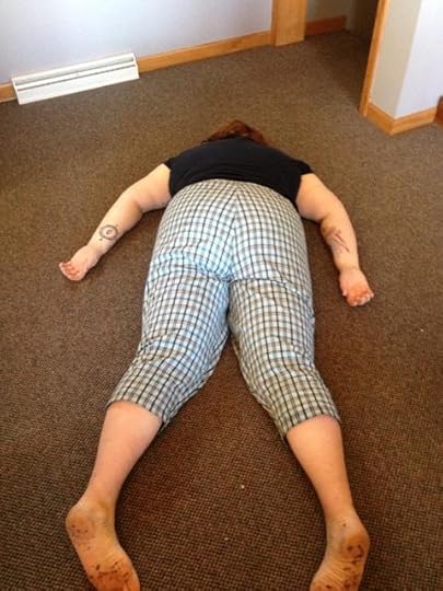 Me lying face down on the floor, taken from a really unflattering angle