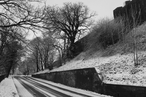 A back road winds behind the ramparts of Carlisle castle. 