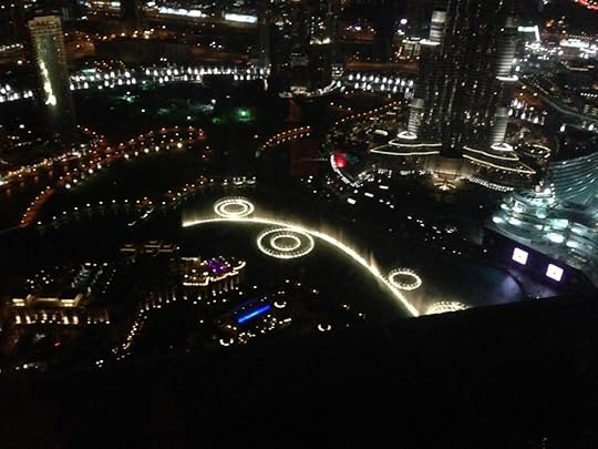 Dubai Fountain, the world's largest dancing fountain, as seen from a tower next to the Burj Khalifa. In the upper right corner of the photograph is the lower portion of Burj Khalifa. From this great height we were nevertheless still craning our necks to see the top of that epic skyscraper.