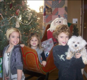 Laityn in the sled. The family's last photo with Mia. 