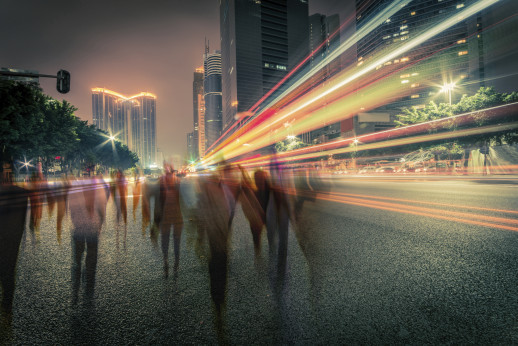 Traffic on a street at night, long exposure.