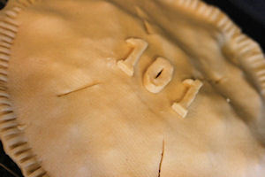 Use water to glue on any decorative touches.