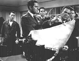 Craig Stevens (left) in The Deadly Mantis