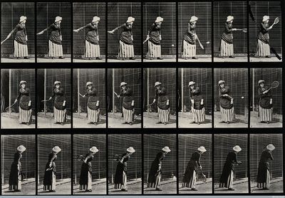 Woman hitting a tennis ball
