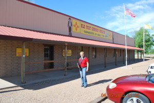 woman in front of the Billy the Kid museum