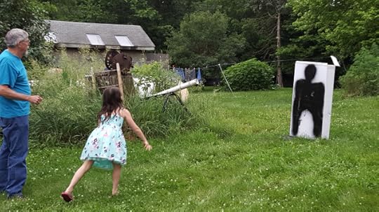 My sweet baby cousin (also my mini-me) showin g us all how it is done with one throw. I want her on my apocalypse team....