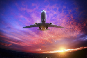 airplane-at-sunset-459911085