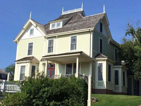 Neither Cape Cod style nor shingle style, yet classic shore home. I could definitely imagine a ghost walking the widow's walk.