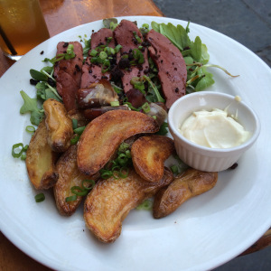 Smoked duck breast slices with roasted fingerlings