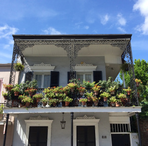 I loved the cute flowerpots on this balcony!