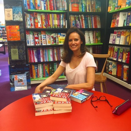 Signing stock at Waterstones bookstore in Piccadilly.