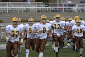 Carmel players rush field
