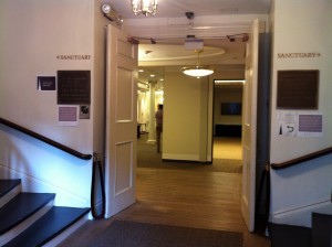 Foyer of Park Street Church in Boston. Two circular staircases lead to the sanctuary upstairs. The doorway leads to meeting rooms and classrooms. (Photo: Sarah Sundin, July 2014)