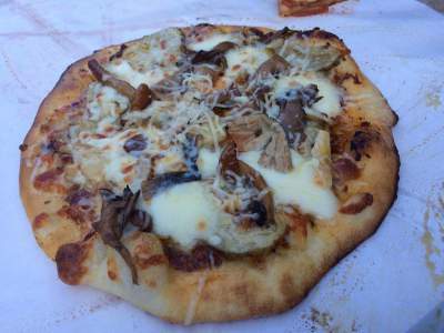 Also a half dozen other pizzas including this mushroom and cheese.